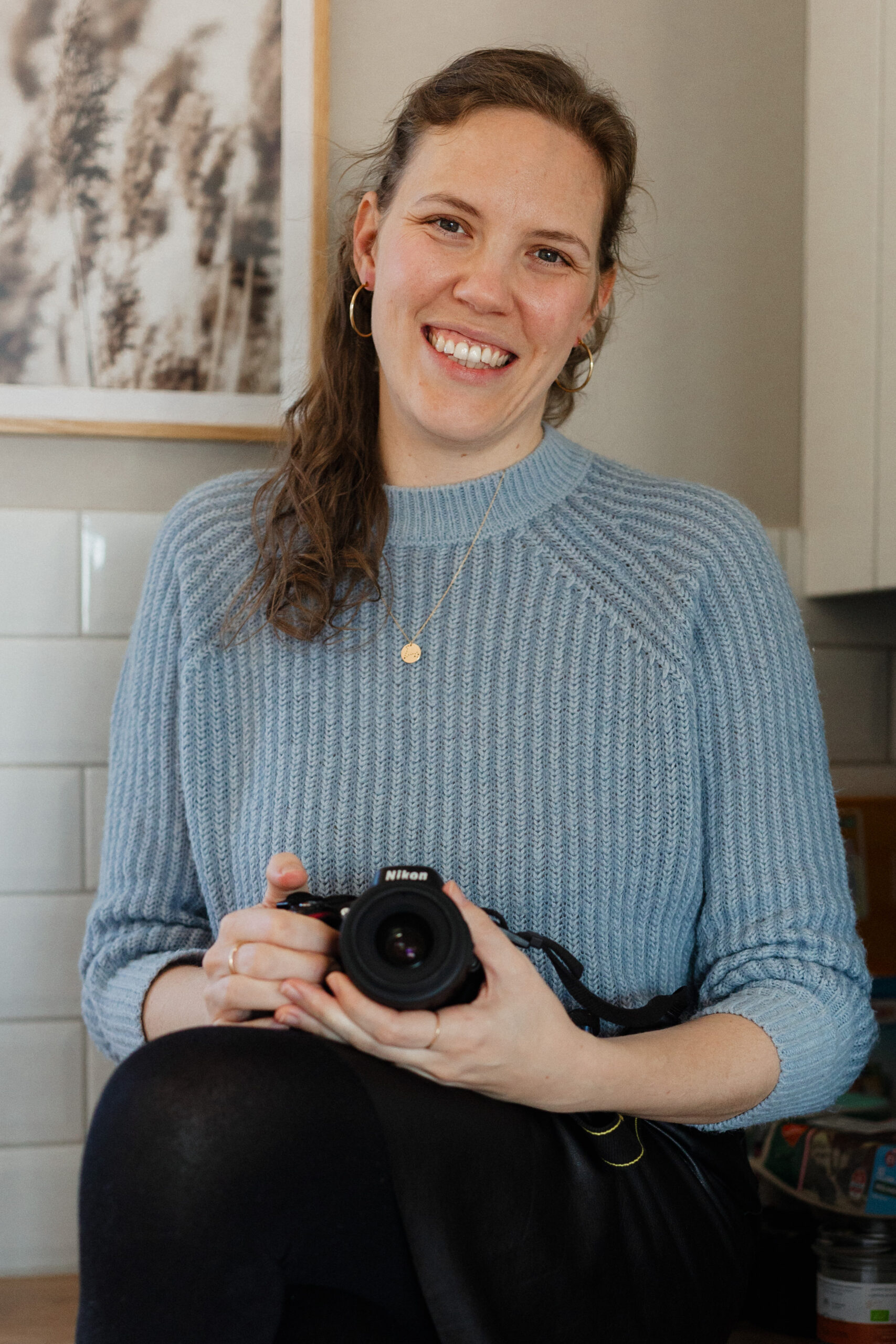 lächelnde Fotografin
